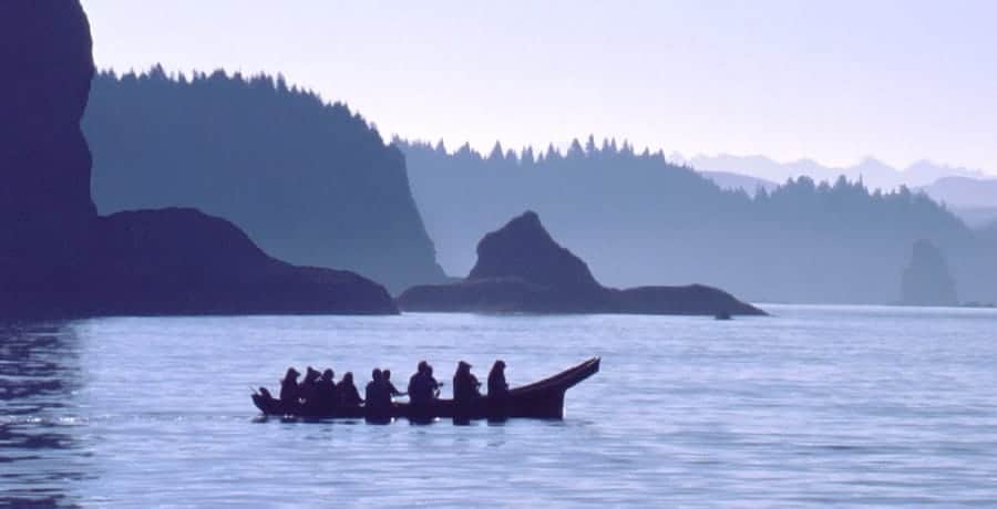 native amerians in canoe