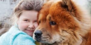 chow chow dog names - girl with dog